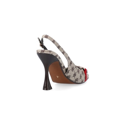 360 degree animation of product Beige RI monogram heeled sling back shoes frame-11