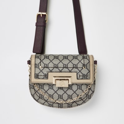 Beige RI monogram lock front belted bum bag