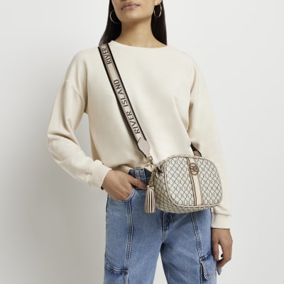 River Island monogram mini kettle bag in beige