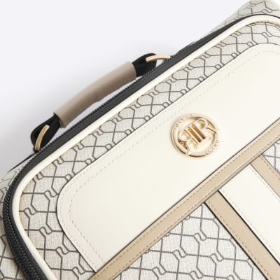 Beige RI monogram suitcase River Island