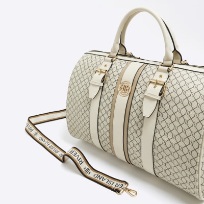 River Island jacquard barrel bag in beige