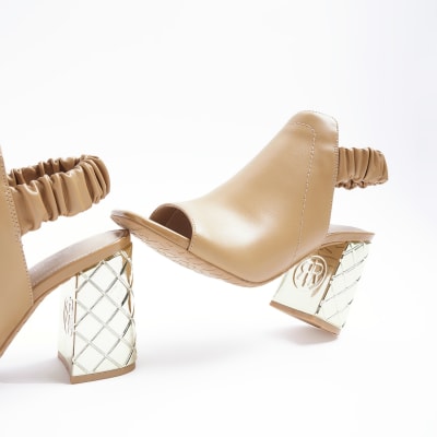Beige scrunched back heeled boots