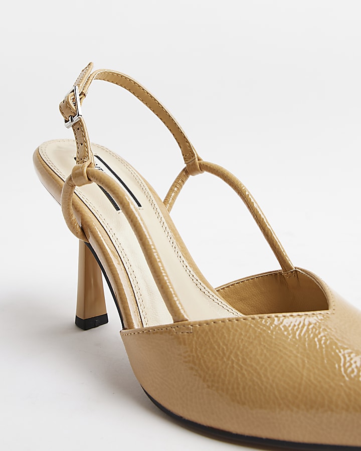 Beige sling back heeled court shoes