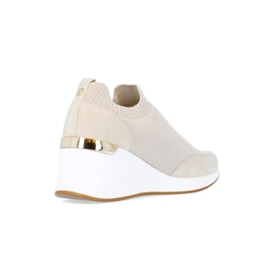 360 degree animation of product Beige slip on wedge trainers frame-12