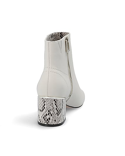 360 degree animation of product Beige snake print block heel boots frame-10