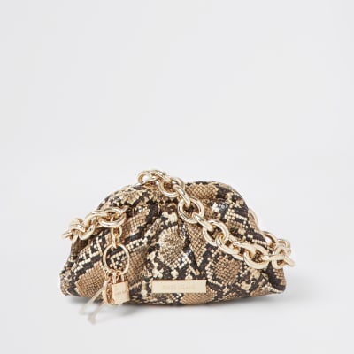 beige snake print bag