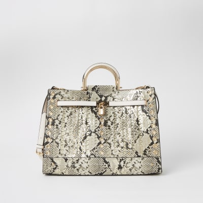 beige snake print bag