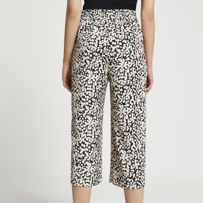 Beige spot print wide leg crop trousers