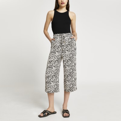 Beige spot print wide leg crop trousers