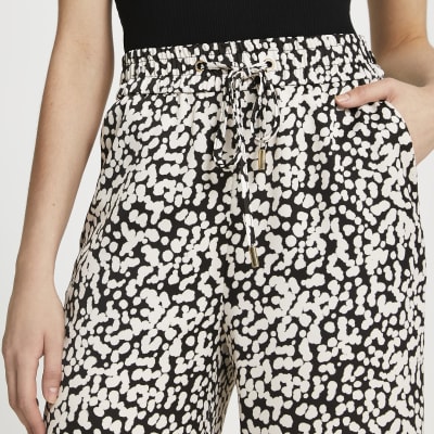 Beige spot print wide leg crop trousers