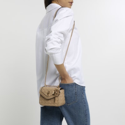Beige studded shoulder bag River Island