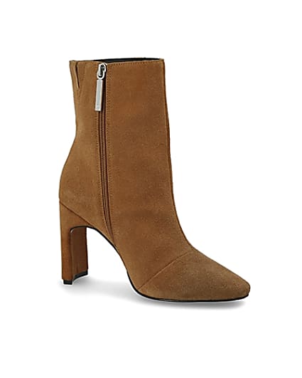 360 degree animation of product Beige suede heeled ankle boot frame-17