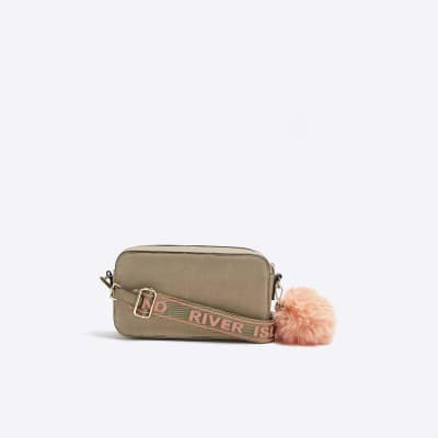 Beige suedette pom pom cross body bag River Island