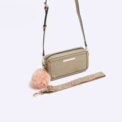 Beige suedette pom pom cross body bag River Island