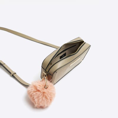 Beige suedette pom pom cross body bag River Island