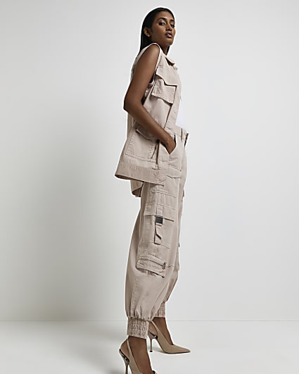 Beige tapered cargo trousers