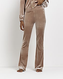 Beige velour flare trousers