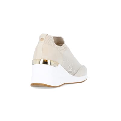 360 degree animation of product Beige wide fit slip on wedge trainers frame-11