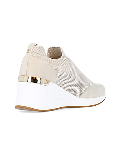 360 degree animation of product Beige wide fit slip on wedge trainers frame-12