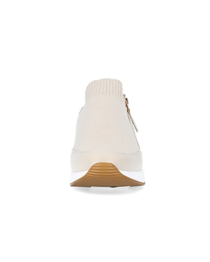 360 degree animation of product Beige wide fit slip on wedge trainers frame-21