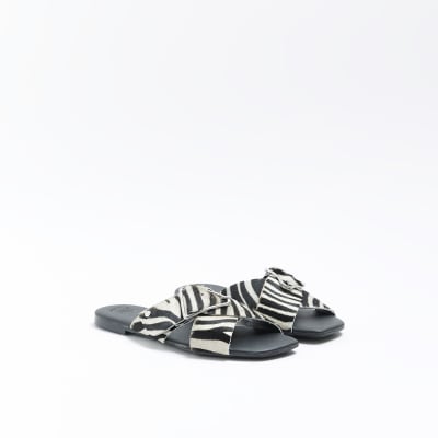 Black animal print flat sandals | River Island