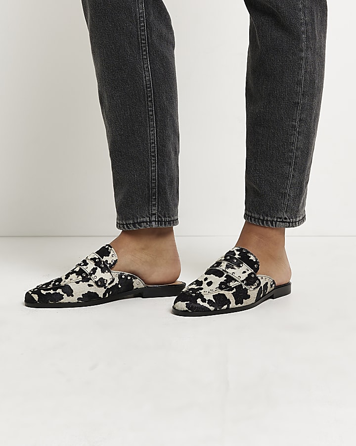 Black animal print leather backless loafers
