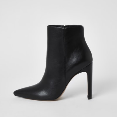 black ankle boots with tan heel
