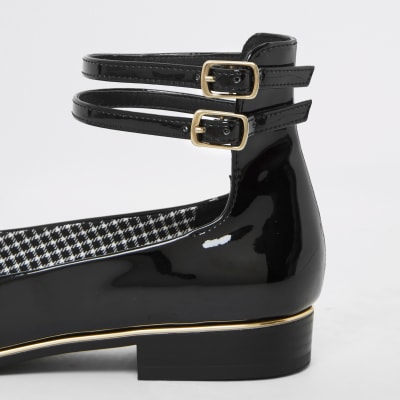 Black ankle strap ballet shoe