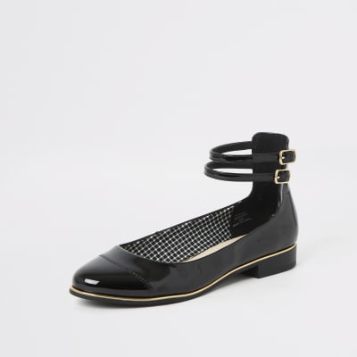 Black ankle strap ballet shoe