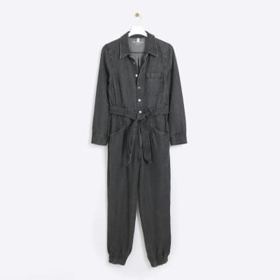 Black belted denim jumpsuit | River Island