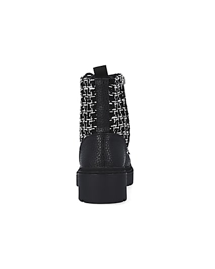 360 degree animation of product Black boucle biker boots frame-9
