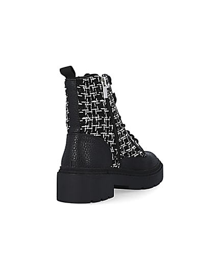 360 degree animation of product Black boucle biker boots frame-11