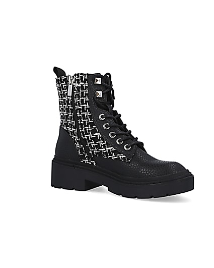 360 degree animation of product Black boucle biker boots frame-17