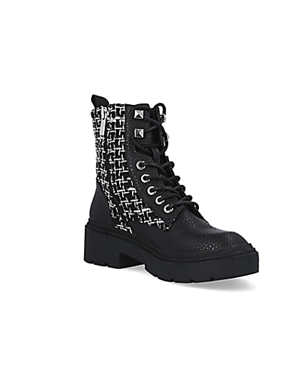 360 degree animation of product Black boucle biker boots frame-18