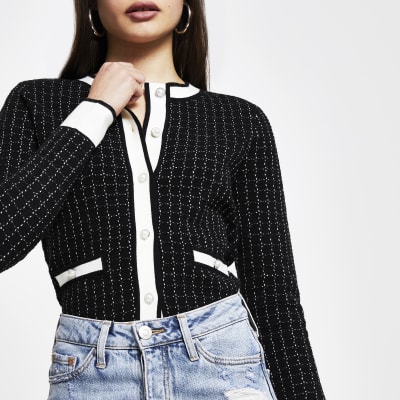 black mom jeans white stitching
