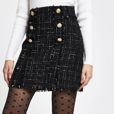 Black boucle gold button mini skirt | River Island