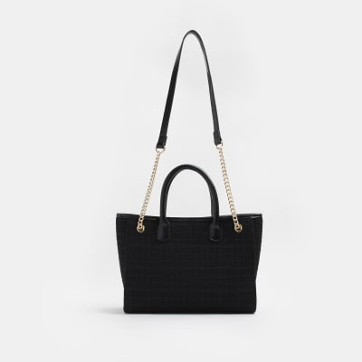 Black boucle RI monogram shoulder bag