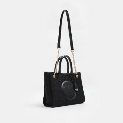 Black boucle RI monogram shoulder bag