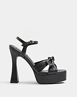 Black bow platform heeled sandals