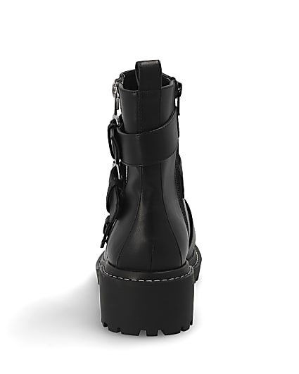 360 degree animation of product Black buckle chunky biker boots frame-9