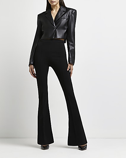 Black buckle detail flared trousers