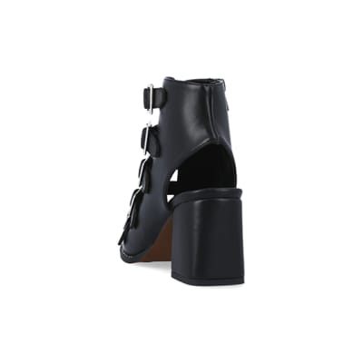 360 degree animation of product Black buckle heeled shoes frame-8