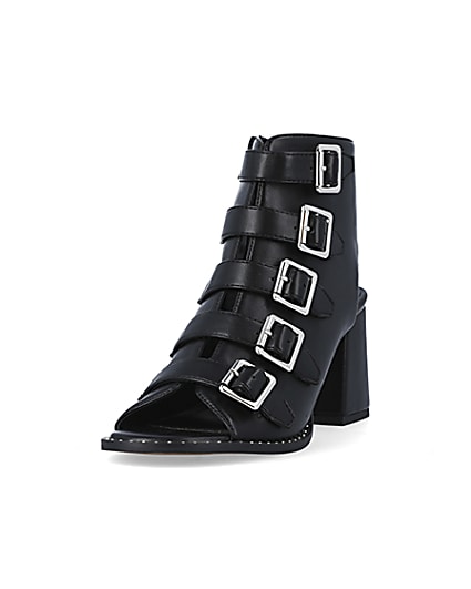 360 degree animation of product Black buckle heeled shoes frame-23