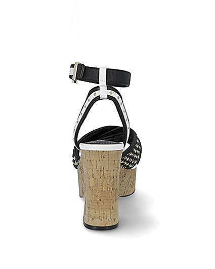 360 degree animation of product Black buckle platform heels frame-9