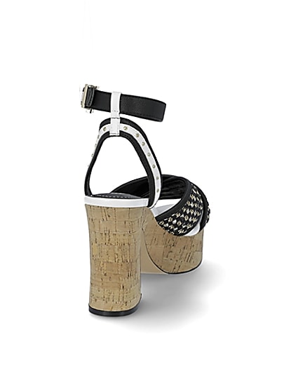 360 degree animation of product Black buckle platform heels frame-10