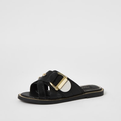 black buckle strap sandals