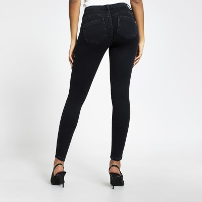 Black bum sculpting Molly mid rise jeggings