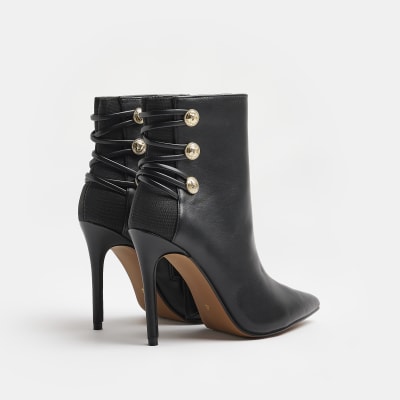 Black button detail heeled boots