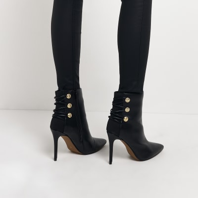 Black button detail heeled boots