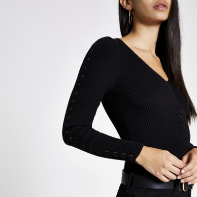 Black cable knit V neck jumper